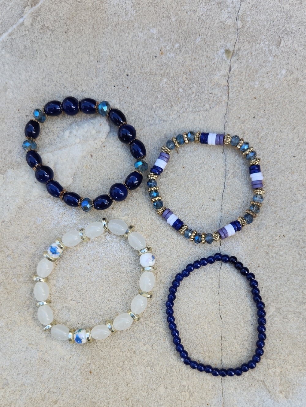 Set of Four Women's Beaded Bracelets Metallic Iridecent Floral Blue Gold White